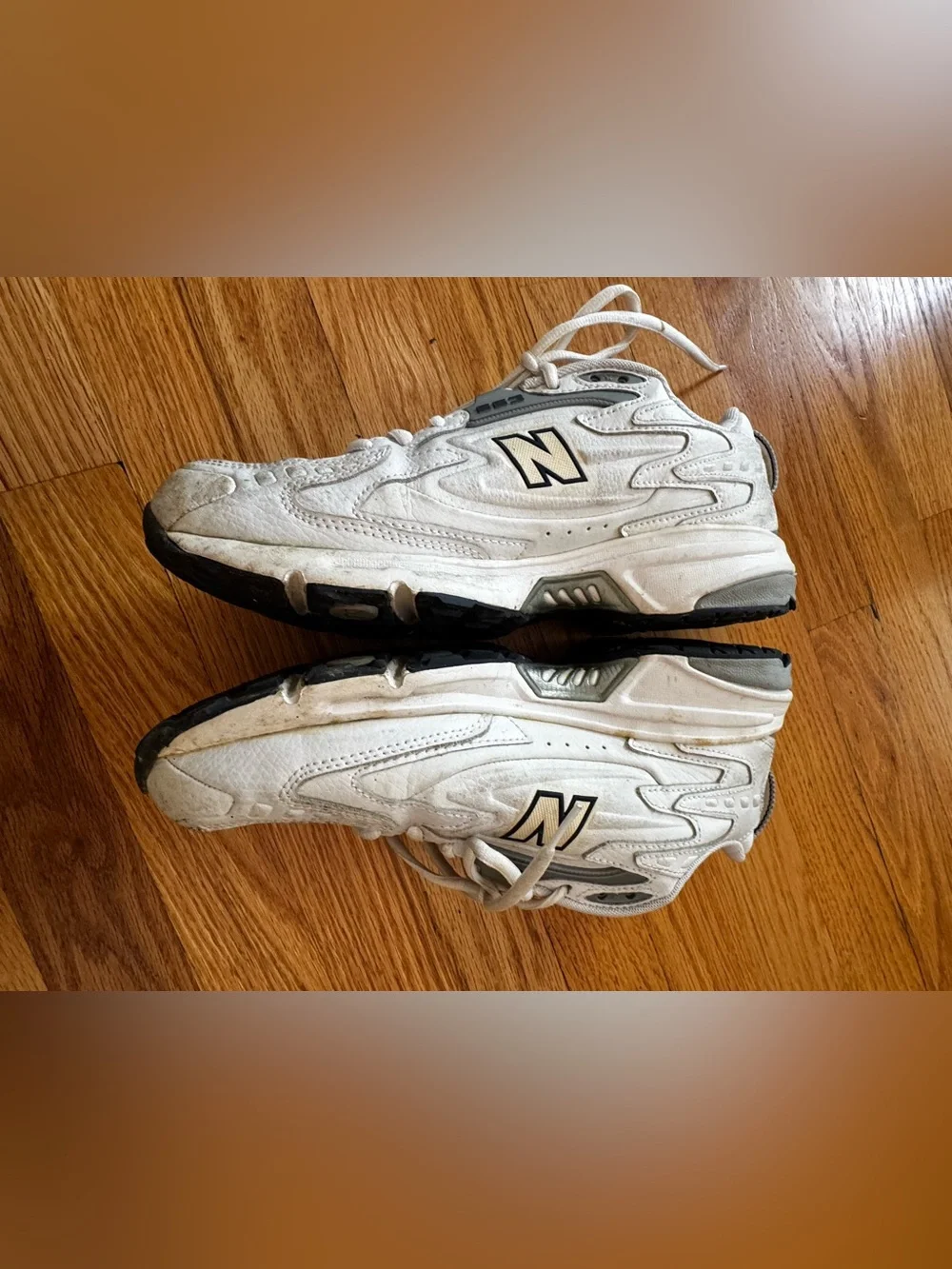 New Balance Men’s White Sneakers with Navy and Gray Accents